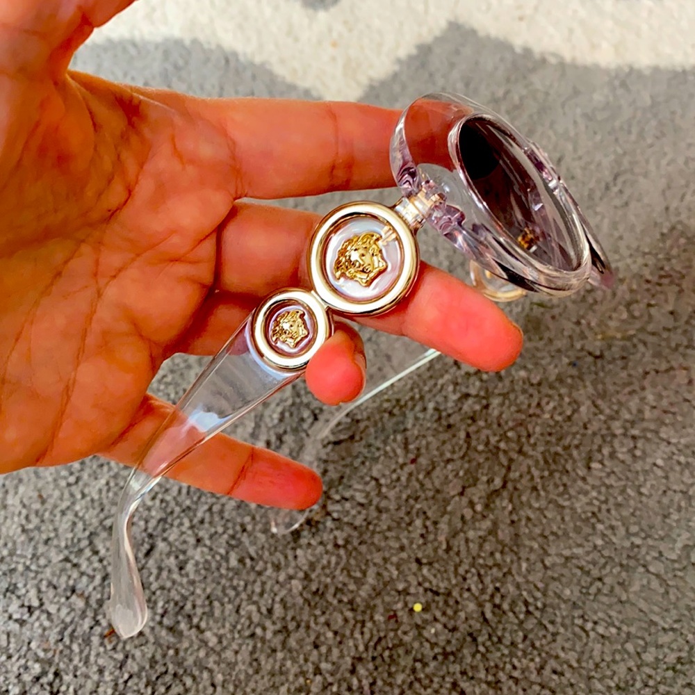 Versace sunglasses , clear frame , gold/silver details